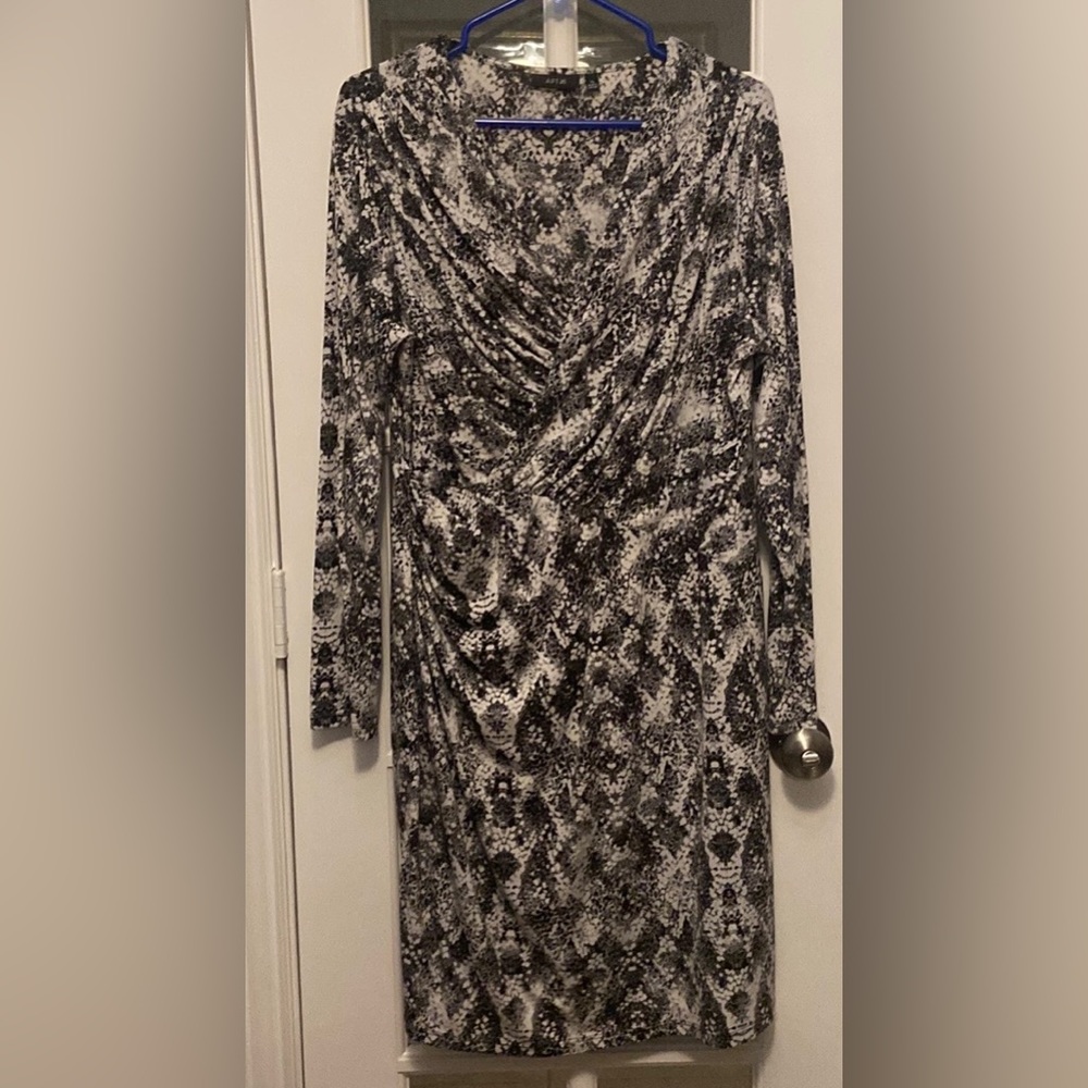 Beautiful black and white dress with V neck front